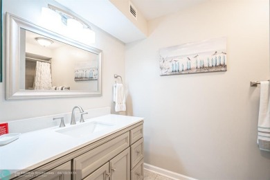 Spacious 2 bedroom, 2 bath condo well located in Deer Creek on Deer Creek Golf Club in Florida - for sale on GolfHomes.com, golf home, golf lot