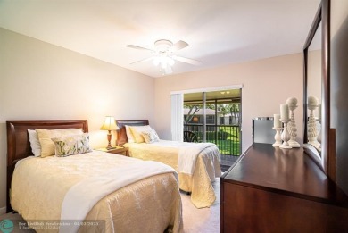 Spacious 2 bedroom, 2 bath condo well located in Deer Creek on Deer Creek Golf Club in Florida - for sale on GolfHomes.com, golf home, golf lot