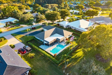 WOW! Perfectly sited on a premier .34-acre lot overlooking one on Atlantis Golf Club in Florida - for sale on GolfHomes.com, golf home, golf lot