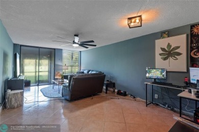 This ground floor condo is one of the few non age restricted on Colony West Country Club in Florida - for sale on GolfHomes.com, golf home, golf lot