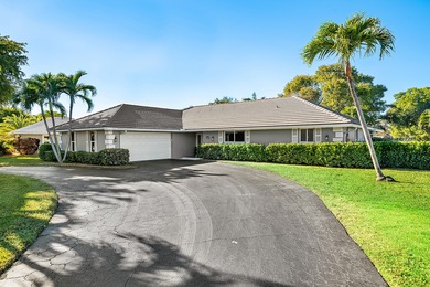 WOW! Perfectly sited on a premier .34-acre lot overlooking one on Atlantis Golf Club in Florida - for sale on GolfHomes.com, golf home, golf lot