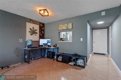 This ground floor condo is one of the few non age restricted on Colony West Country Club in Florida - for sale on GolfHomes.com, golf home, golf lot