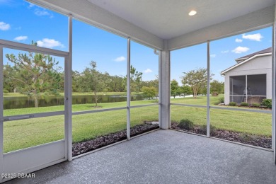 Enjoy Sunrise on your lanai with a fantastic water view! Classic on Plantation Bay Golf and Country Club in Florida - for sale on GolfHomes.com, golf home, golf lot