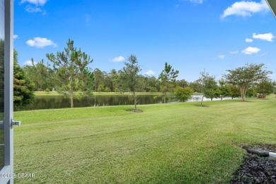 Enjoy Sunrise on your lanai with a fantastic water view! Classic on Plantation Bay Golf and Country Club in Florida - for sale on GolfHomes.com, golf home, golf lot