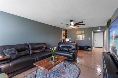 This ground floor condo is one of the few non age restricted on Colony West Country Club in Florida - for sale on GolfHomes.com, golf home, golf lot