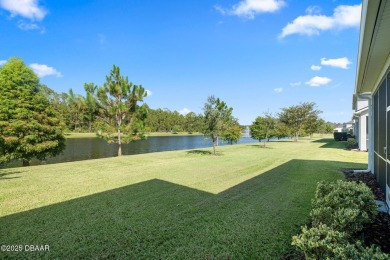 Enjoy Sunrise on your lanai with a fantastic water view! Classic on Plantation Bay Golf and Country Club in Florida - for sale on GolfHomes.com, golf home, golf lot