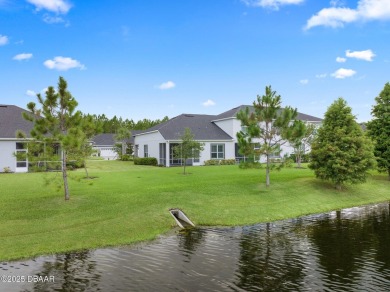 Enjoy Sunrise on your lanai with a fantastic water view! Classic on Plantation Bay Golf and Country Club in Florida - for sale on GolfHomes.com, golf home, golf lot