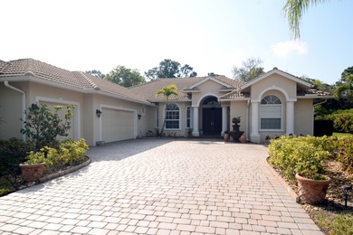 Stunning 3 bedroom, 3.5 pool home situated on an estate lot on Meadowood Golf and Tennis Club in Florida - for sale on GolfHomes.com, golf home, golf lot