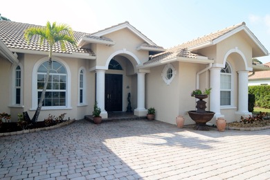 Stunning 3 bedroom, 3.5 pool home situated on an estate lot on Meadowood Golf and Tennis Club in Florida - for sale on GolfHomes.com, golf home, golf lot