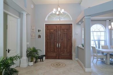 Stunning 3 bedroom, 3.5 pool home situated on an estate lot on Meadowood Golf and Tennis Club in Florida - for sale on GolfHomes.com, golf home, golf lot