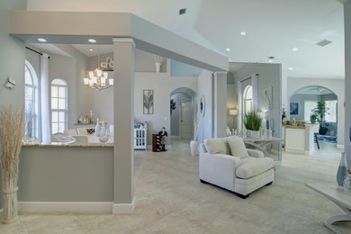 Stunning 3 bedroom, 3.5 pool home situated on an estate lot on Meadowood Golf and Tennis Club in Florida - for sale on GolfHomes.com, golf home, golf lot