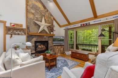 Welcome to 'Evening Shade', a charming, furnished cabin nestled on Alpine Lake Resort in West Virginia - for sale on GolfHomes.com, golf home, golf lot