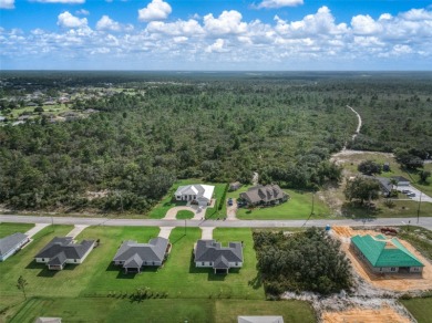 Welcome to this 2023-built residence in the sought-after Sun N' on Sun n Lake Golf and Country Club in Florida - for sale on GolfHomes.com, golf home, golf lot