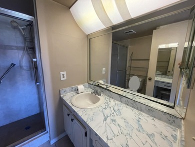 This 2 bed/2 bath top floor home has tons of potential!  With on Sunrise Lakes Phase III in Florida - for sale on GolfHomes.com, golf home, golf lot