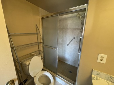 This 2 bed/2 bath top floor home has tons of potential!  With on Sunrise Lakes Phase III in Florida - for sale on GolfHomes.com, golf home, golf lot