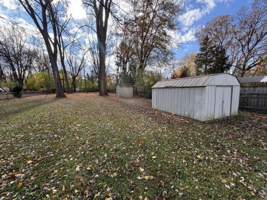 Discover this beautifully updated home on a spacious 1/2-acre on Plum Hollow Country Club in Michigan - for sale on GolfHomes.com, golf home, golf lot