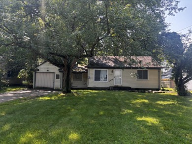 Discover this beautifully updated home on a spacious 1/2-acre on Plum Hollow Country Club in Michigan - for sale on GolfHomes.com, golf home, golf lot