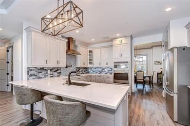 Welcome to this exceptional custom pool home, perfectly on The Golf Club of Cypress Creek in Florida - for sale on GolfHomes.com, golf home, golf lot