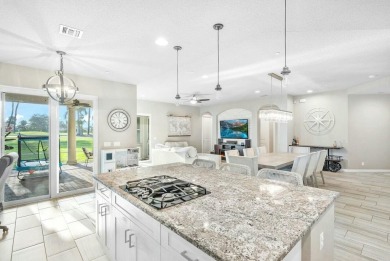 Welcome to an exquisite ground-floor residence in the on Jupiter Country Club in Florida - for sale on GolfHomes.com, golf home, golf lot