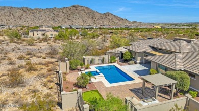 Experience luxury living in this sleek and stylish Desert on Verrado Golf Club  in Arizona - for sale on GolfHomes.com, golf home, golf lot