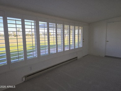 Panoramic golf course views in this desirable end-unit, 4-plex on Sun City South Golf Course in Arizona - for sale on GolfHomes.com, golf home, golf lot