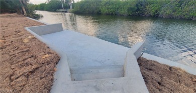 **Newly Completed SEAWALL with CONCRETE DOCK!**

Here's a great on Coral Oaks Golf Course in Florida - for sale on GolfHomes.com, golf home, golf lot