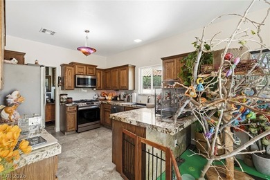 GUARD GATED, ON THE GOLF COURSE, WITH A POOL! This beautifully on Painted Desert Golf Club in Nevada - for sale on GolfHomes.com, golf home, golf lot