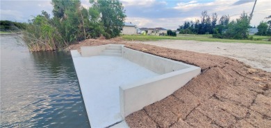 **Newly Completed SEAWALL with CONCRETE DOCK!**

Here's a great on Coral Oaks Golf Course in Florida - for sale on GolfHomes.com, golf home, golf lot