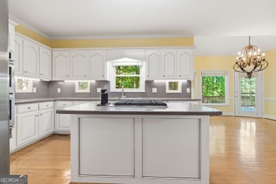 Stately elegance and livable luxury await at this expansive 5 on Brookstone Golf and Country Club in Georgia - for sale on GolfHomes.com, golf home, golf lot