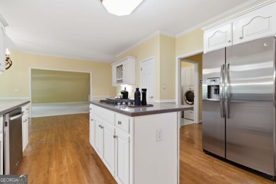 Stately elegance and livable luxury await at this expansive 5 on Brookstone Golf and Country Club in Georgia - for sale on GolfHomes.com, golf home, golf lot