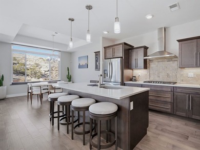 ROOFTOP PATIO, MONUMENT VIEWS...WOW!! Discover the unparalleled on The Golf Club At Redlands Mesa in Colorado - for sale on GolfHomes.com, golf home, golf lot