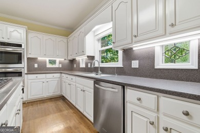 Stately elegance and livable luxury await at this expansive 5 on Brookstone Golf and Country Club in Georgia - for sale on GolfHomes.com, golf home, golf lot