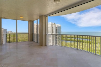 Imagine waking up to the vibrant hues of sunrise painting the on Club at Pelican Bay Golf Course in Florida - for sale on GolfHomes.com, golf home, golf lot