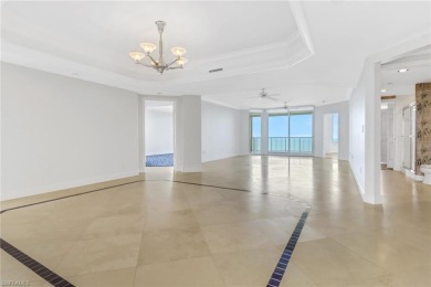 Imagine waking up to the vibrant hues of sunrise painting the on Club at Pelican Bay Golf Course in Florida - for sale on GolfHomes.com, golf home, golf lot