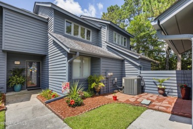 This home is charming! Located right in the heart of Hampstead on Olde Point Golf and Country Club in North Carolina - for sale on GolfHomes.com, golf home, golf lot