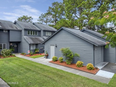 This home is charming! Located right in the heart of Hampstead on Olde Point Golf and Country Club in North Carolina - for sale on GolfHomes.com, golf home, golf lot