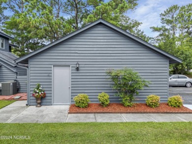 This home is charming! Located right in the heart of Hampstead on Olde Point Golf and Country Club in North Carolina - for sale on GolfHomes.com, golf home, golf lot