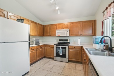 Charming and fully furnished, this delightful 2-bedroom on Mission Royale Golf Club in Arizona - for sale on GolfHomes.com, golf home, golf lot
