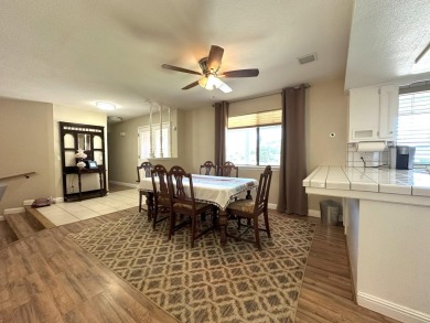 Situated on the picturesque River Island Golf Course, this half on River Island Country Club in California - for sale on GolfHomes.com, golf home, golf lot