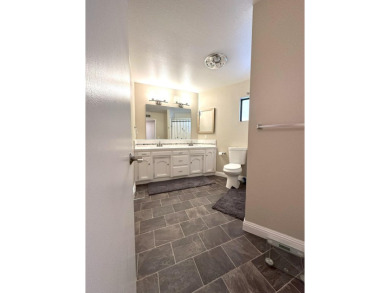 Situated on the picturesque River Island Golf Course, this half on River Island Country Club in California - for sale on GolfHomes.com, golf home, golf lot