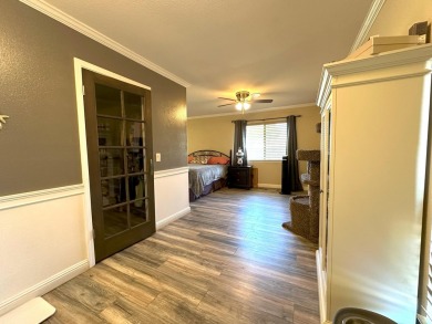 Situated on the picturesque River Island Golf Course, this half on River Island Country Club in California - for sale on GolfHomes.com, golf home, golf lot