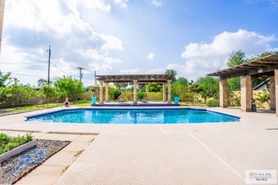 This beautiful 4-bedroom, 3.5-bath home with a finished 3-car on South Padre Island Golf Club in Texas - for sale on GolfHomes.com, golf home, golf lot