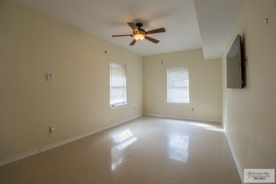 This beautiful 4-bedroom, 3.5-bath home with a finished 3-car on South Padre Island Golf Club in Texas - for sale on GolfHomes.com, golf home, golf lot