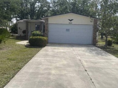 TIRED OF SNOW,ICE AND COLD, TRADE THAT IN FOR SUN,WARM AND WHITE on Pine Lakes Country Club in Florida - for sale on GolfHomes.com, golf home, golf lot