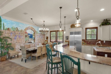 This impeccable Mediterranean home is located at the end of a on Regatta Bay Golf and Country Club in Florida - for sale on GolfHomes.com, golf home, golf lot