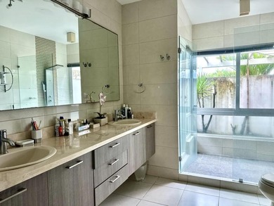 Modern Two-Level Home for Sale with Garden and Terrace
 on  in  - for sale on GolfHomes.com, golf home, golf lot