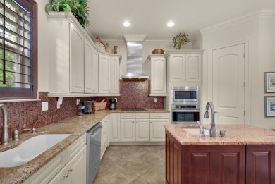 This impeccable Mediterranean home is located at the end of a on Regatta Bay Golf and Country Club in Florida - for sale on GolfHomes.com, golf home, golf lot