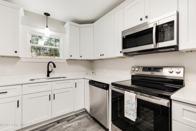 DOUBLE your pleasure with this fully renovated home on 2 LOTS, 2 on Founders Club At St. James Plantation in North Carolina - for sale on GolfHomes.com, golf home, golf lot