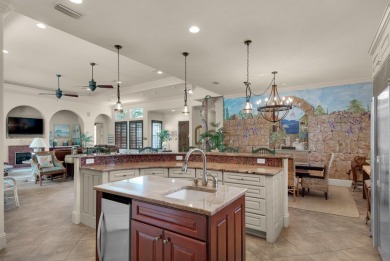 This impeccable Mediterranean home is located at the end of a on Regatta Bay Golf and Country Club in Florida - for sale on GolfHomes.com, golf home, golf lot
