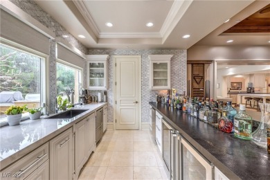 Timeless elegance meets modern luxury at 30 Augusta Canyon on Southern Highlands Golf Club in Nevada - for sale on GolfHomes.com, golf home, golf lot